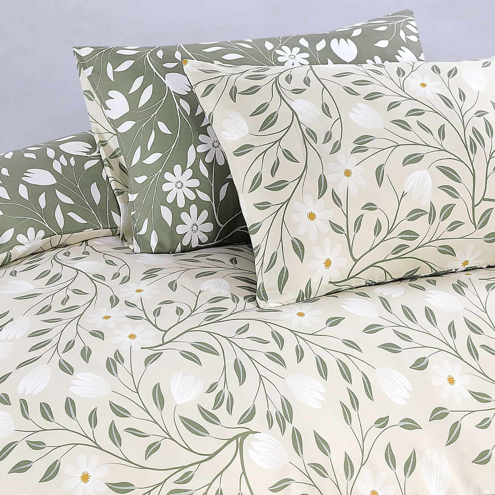 Matching green pillowcases with fitted sheet and duvet