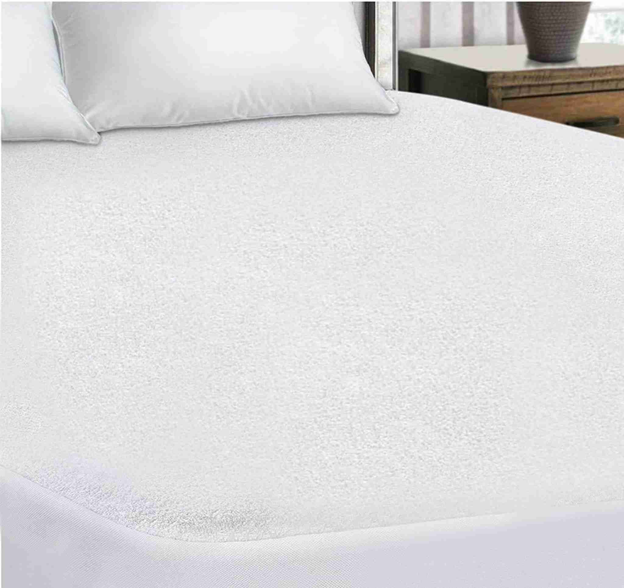 Waterproof bed protector with deep fitted corners